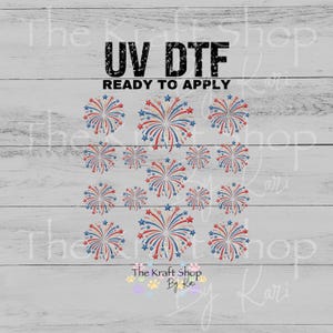 May include: A UV DTF ready to apply transfer sheet featuring a repeating pattern of red, white, and blue firework bursts and star shapes. The text UV DTF READY TO APPLY is printed in black at the top, with The Kraft Shop by Kari at the bottom.