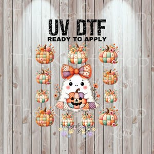 May include: A UV DTF (Direct to Film) transfer design featuring a cute ghost holding a pumpkin, surrounded by decorative pumpkins. The design includes the text "UV DTF READY TO APPLY" in black. The pumpkins and ghost have a patchwork design with floral accents.