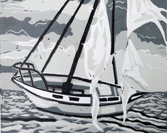 Sailboat with torn sails