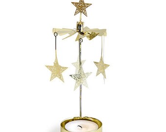 Spinning golden stars. Spinning candle holders. Rotary candle holders. Candle holder. Candle carousel. Tea light holder. Candlestick