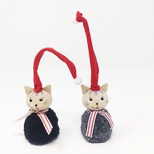 Cats Christmas ornament. Christmas tree ornaments cats. The cap bends and you can hang the cat on the tree on it. Set of Christmas cats