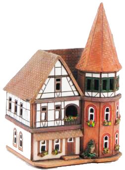 陶器のキャンドルハウス。ドイツの家。陶器の家のティーライト。陶器の