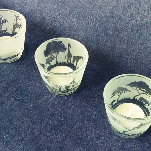 Safari Engraved Glass tea light holder set, featuring elephants, giraffes and more.