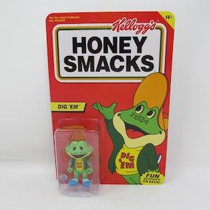Boneco de ação Dig 'Em Frog 3" Kellogg's Honey Smacks Plastic Meatball