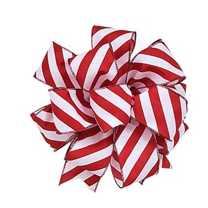 May include: A red and white striped bow with a satin finish. The bow is made of a thick ribbon and has a shiny, festive look.