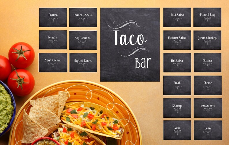 May include: A vibrant image showcasing a taco bar setup. The scene includes a plate of tacos with toppings, tortilla chips, and guacamole. Black chalkboards list ingredients like lettuce, tomatoes, and various salsas. The words "Taco Bar" are prominently displayed.