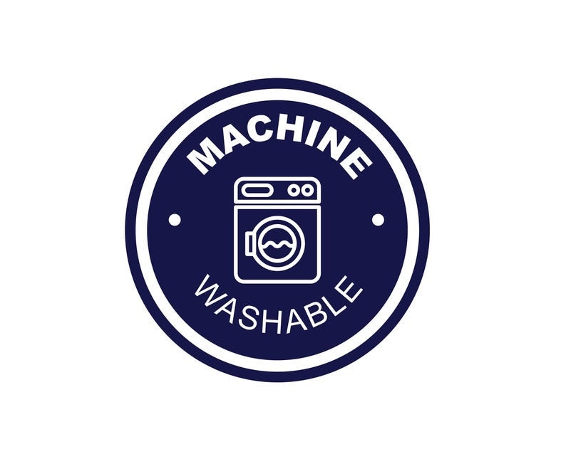 Puede incluir: Una etiqueta circular azul y blanca con el texto "MACHINE WASHABLE" y un icono estilizado de una lavadora.