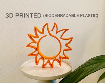 Escultura de sol: decoración minimalista para mesa