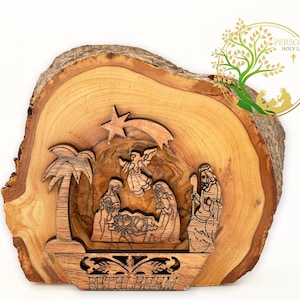 Handgemaakte kerststal van olijfhout: gesneden kerststal