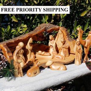 Nativity Set | Hand carved Nativity scene from The Holy Land | Olive wood Nativity carved inside of Olive Tree Branch | Christmas Decoration