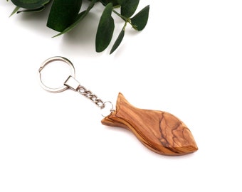 Hand-Carved 3D Olive Wood Fish Keychain, A Symbol of Christianity and Faith Crafted from the Holy Land's Blessed Olive Trees.