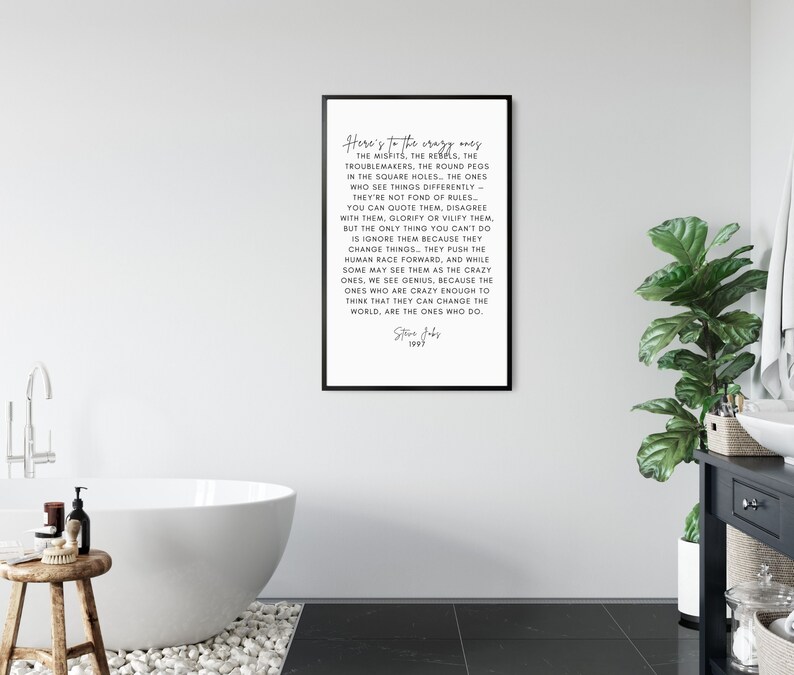 May include: Black and white typography print with a quote by Steve Jobs. The quote reads "Here's to the crazy ones...the ones who are crazy enough to think that they can change the world, are the ones who do."