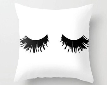 throw pillow with eyelashes