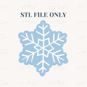May include: A light blue snowflake design with white details. The image includes the text "STL FILE ONLY". This design is likely for a cookie cutter or similar craft project, perfect for winter or holiday baking.