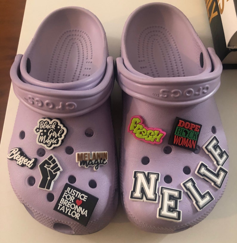 what stores sell charms for crocs