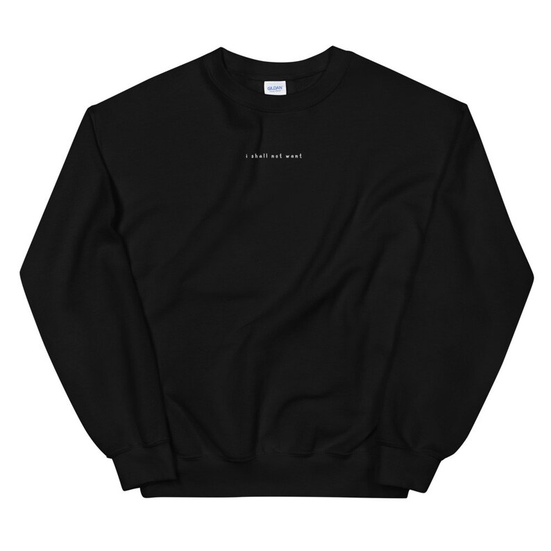 May include: Black sweatshirt with the text "I shall not want" in white on the front.