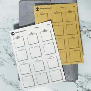May include: A sheet of white memo stickers with a black outline and a small clipboard icon in the top left corner. The stickers are arranged in a grid of 12, with the text "Memos" and "020" printed at the top of the sheet.