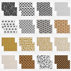 Puede incluir: Una colección de dieciséis manteles individuales con varios patrones. Los diseños incluyen hojas, olas, chevrones y patrones florales en blanco y negro. Otros manteles individuales presentan formas geométricas, mariposas y arte abstracto en oro, negro y blanco.