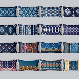 May include: A collection of rectangular throw pillows with various geometric patterns in shades of blue, red, orange, and white. The pillows are arranged in rows, showcasing a variety of designs, including diamonds, stripes, and floral motifs. The pillows are likely for home decor.