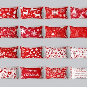 May include: A selection of rectangular Christmas cushions. The cushions display red and white festive patterns, such as snowflakes, reindeer, Christmas trees, and the text "Merry Christmas". These cushions are designed for seasonal home decoration.