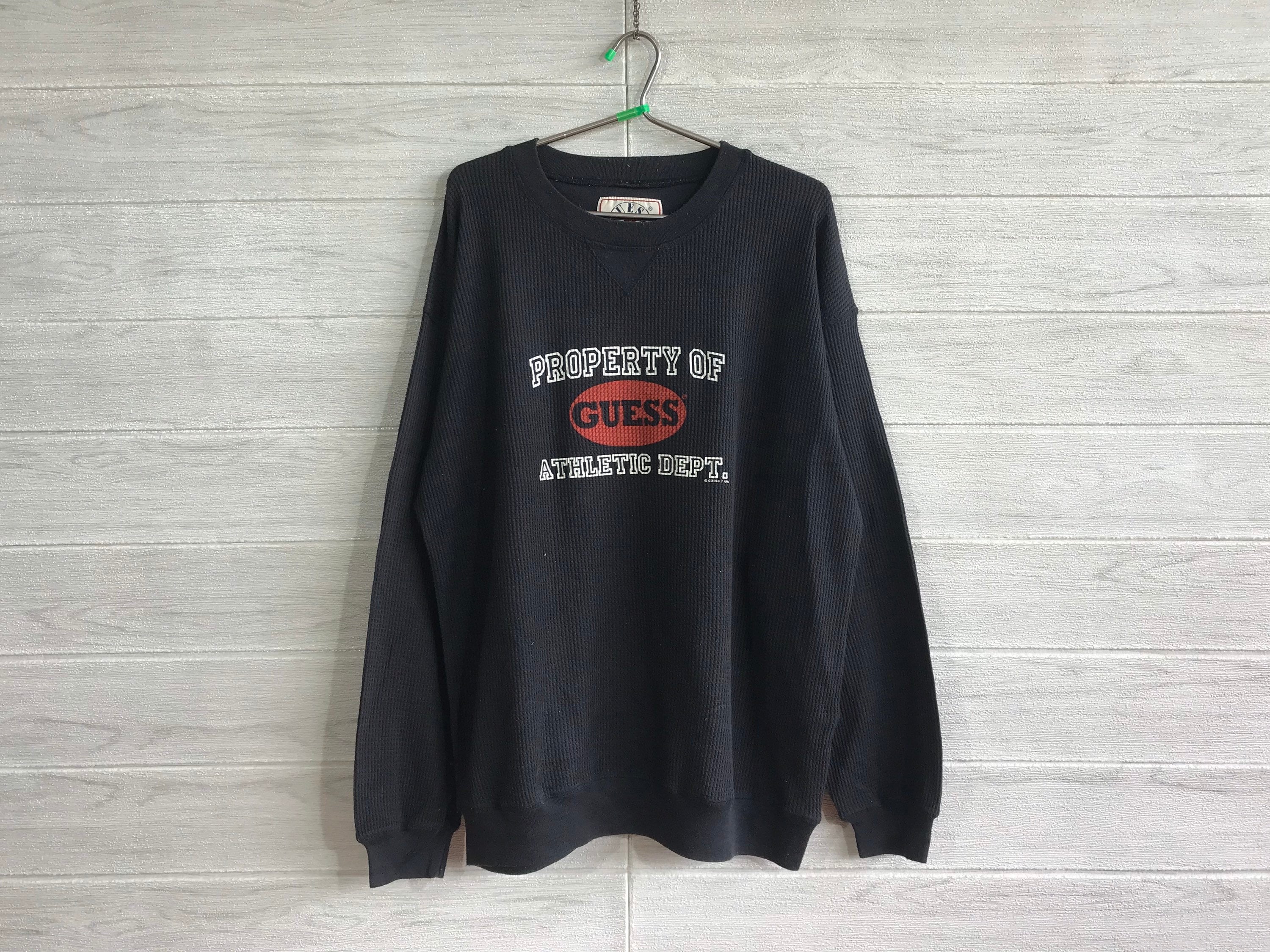 purple guess sweatshirt