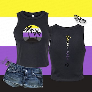 May include: A black tank top with a sunset and palm trees graphic on the front and the text "love wins" on the back. The graphic is in the colors of the non-binary pride flag: yellow, white, purple, and black.
