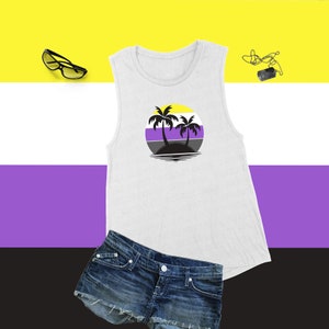 May include: A white sleeveless tank top with a graphic of two palm trees on an island with a sunset behind them. The sunset is in the colors of the non-binary pride flag: yellow, white, purple, and black.