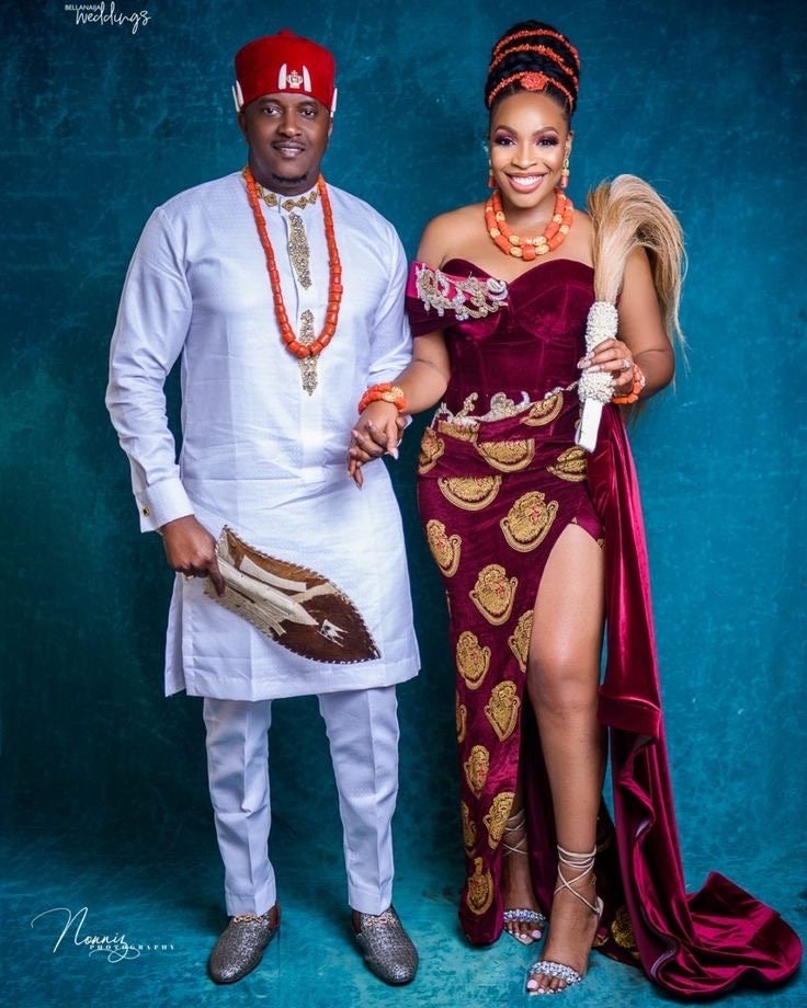 wedding attire for couple. Red isiagu dress. White kaftan for men. Igbo groom outfit. Red African wedding dress. Igbo couple wear. Marriage