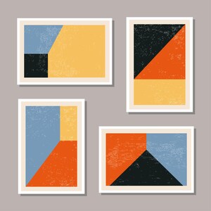 Puede incluir: Un juego de tres tazas de cerámica con un acabado mate moteado. Las tazas son de color crema, gris claro y gris oscuro. Cada taza tiene un diseño simple y minimalista y un asa redondeada.