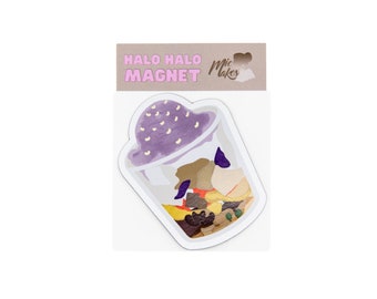May include: A white magnet with a cartoon illustration of a purple and white halo halo dessert in a clear plastic cup. The text "Halo Halo Magnet" and "Mic Makes" is printed on the magnet.