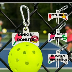 Pickleball Ball Holder Clip with Carabiner – Funny Paddle Accessories for Backpacks, Paddle Bags, Fences – Gift for Pickleball Lovers