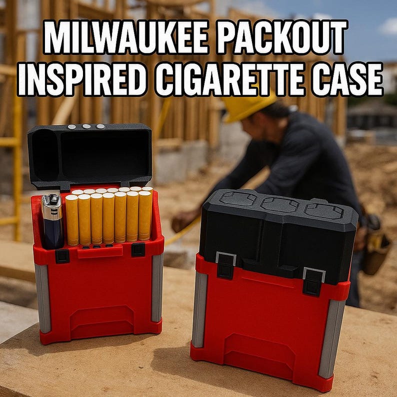May include: Red and black cigarette case with the text "MILWAUKEE PACKOUT INSPIRED CIGARETTE CASE". The case is open, revealing cigarettes and a lighter. A second closed case is next to it. The background shows a construction site.