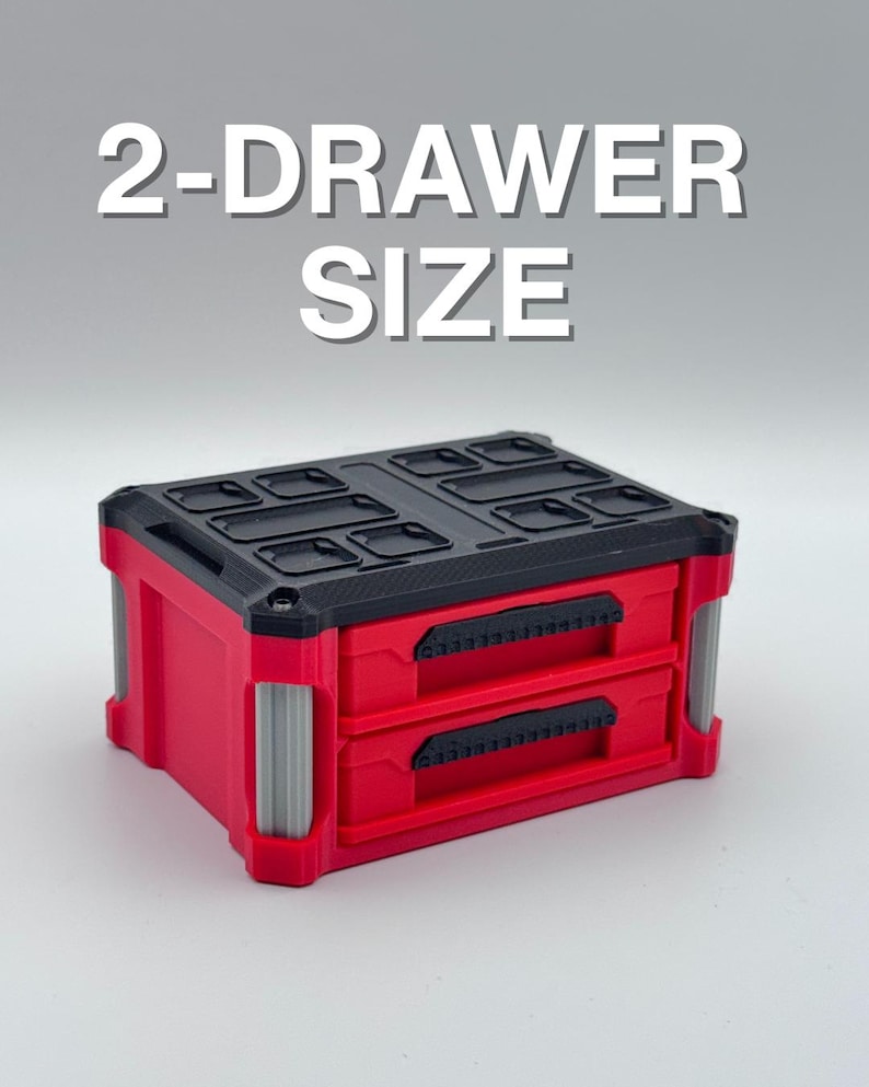 May include: A red 2-drawer storage container with a black top and grey accents. The text "2-DRAWER SIZE" is displayed above the container. The container has two drawers with black handles.