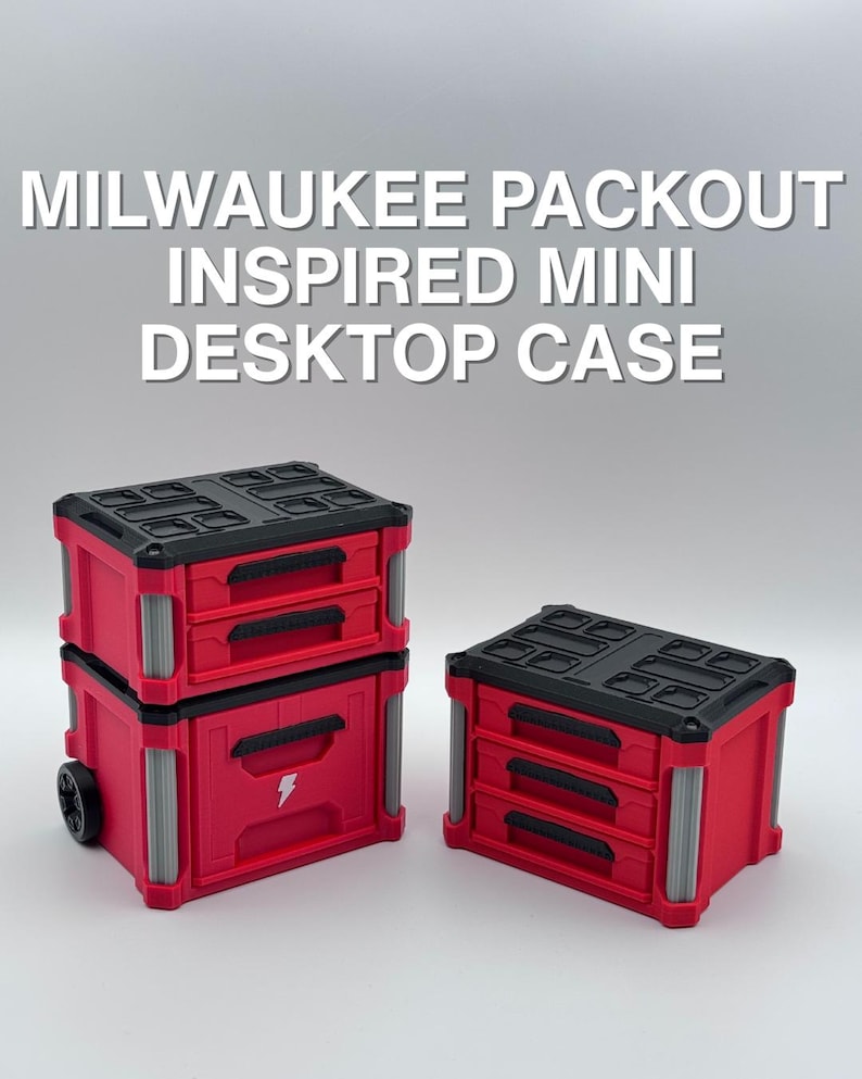 May include: Miniature red and black desktop case with drawers, inspired by the Milwaukee Packout design. The case features a black top and drawer handles, with a red body and grey accents. The text "MILWAUKEE PACKOUT INSPIRED MINI DESKTOP CASE" is displayed.