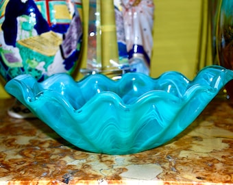 Vintage fussed glass dish in the shape of a shell with dancing blue turquoise lines