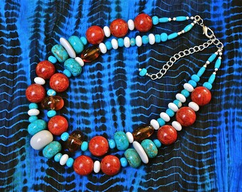 Ethnic inspired designer necklace made from turquoise, white coral and large sea bamboo beads