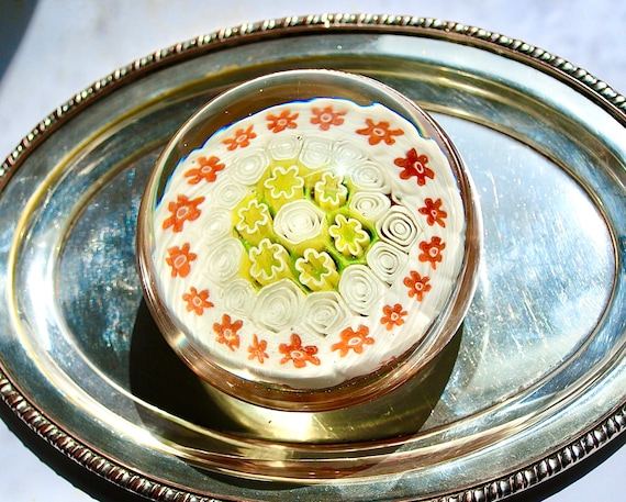 Large and rare glass paperweight made in the 20th century in Scotland in a delicate cream and light citrus colour
