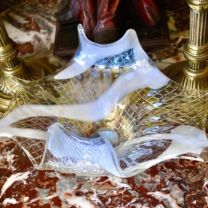 VIntage fabulous handblown vase with milky lines on a clear textured background with iridescent shimmer