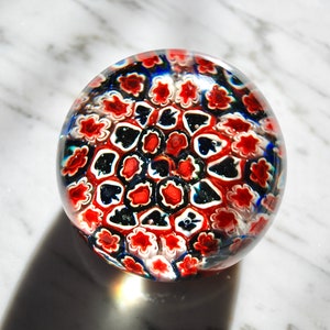Antique dome paperweight with black and white spades shaped millefiori with addition of red/scarlet colour