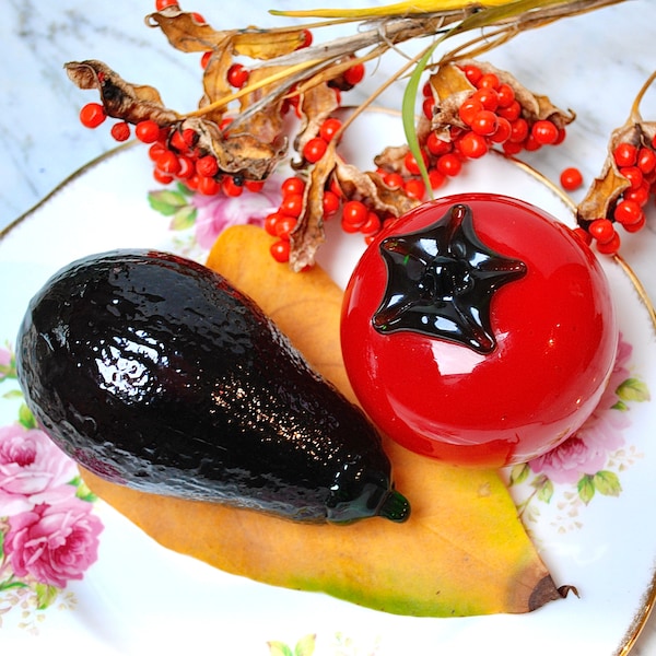 Large Murano style handblown glass vegetables: a deep purple avocado and a juicy red tomato