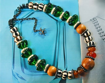 Statement necklace with jumbo handmade green glass beads, African batik bone rondelles, wood and resin caramel semi transparent beads