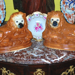 Antique and rare magnificent two large pottery lions made in Scotland in the Victorian era, having glass eyes and hand painted