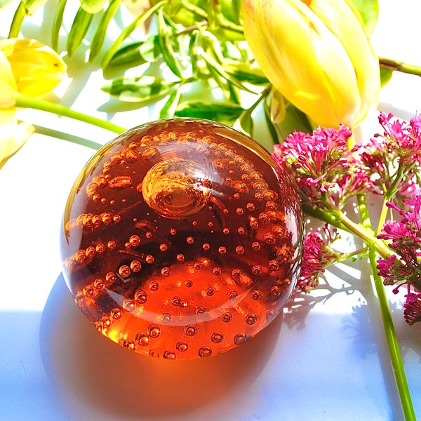 Large vintage controlled bubbles magnificent paperweight in a rich copper colour, Whitefriars of London