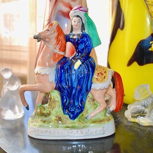 Antique large Staffordshire pottery figurine of the Empress of France on a magnificent horse