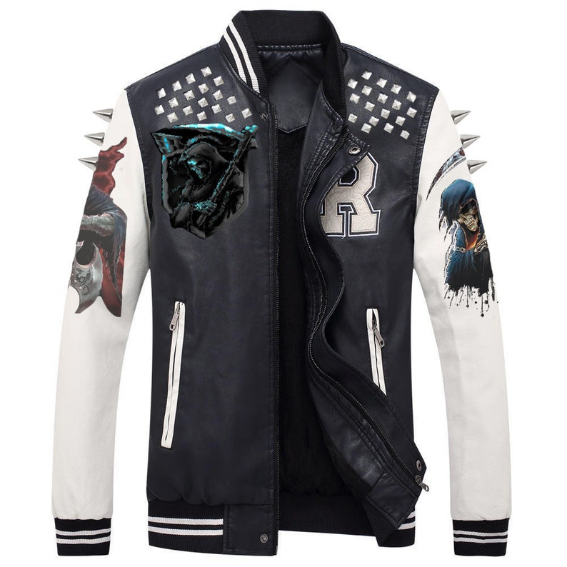 May include: Black and white varsity jacket with graphic art on the sleeves and chest. The jacket features a black body, white sleeves, and silver stud accents. The jacket has a zipper closure and a ribbed collar and cuffs.