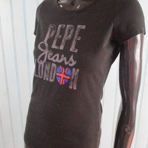 Pepe Jeans T-shirt.  pepe jeans\vintage pepe\vintage tee shirt\pepe tee shirt\black tee shirt\retro tee shirt