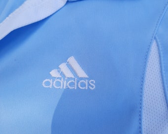 Maillot Adidas bleu pâle. excersize\retro\sports\adidas\haut d'été\haut de sport\