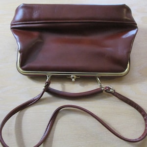 Pleather brown hand bag.  hand bag\luggage\shoulder bag\accessories\hold all