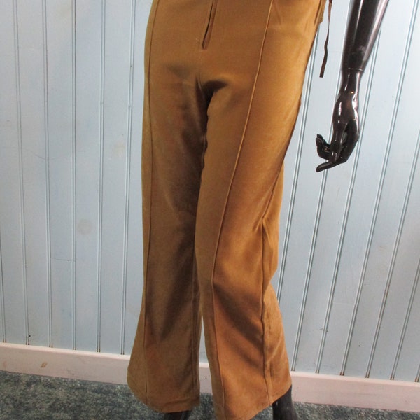 Pantalon rétro des années 70 en fausse moleskine beige.