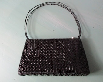 Vintage evening bag covered with black beads and a beaded handle.  vintage\evening bag\beaded bag\handbag\retro